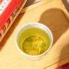 Close-up detail of burdock dandelion goji herbal tea in cup