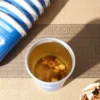 Close-up detail of mulberry red date longan herbal tea in cup