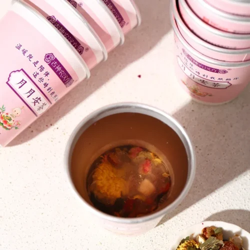 Close-up detail of red date goji poria herbal tea in cup