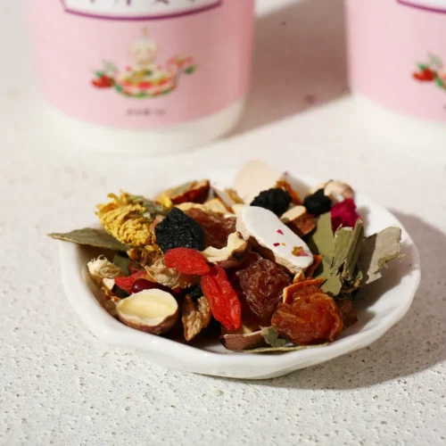 Red date goji poria herbal tea in cup package display