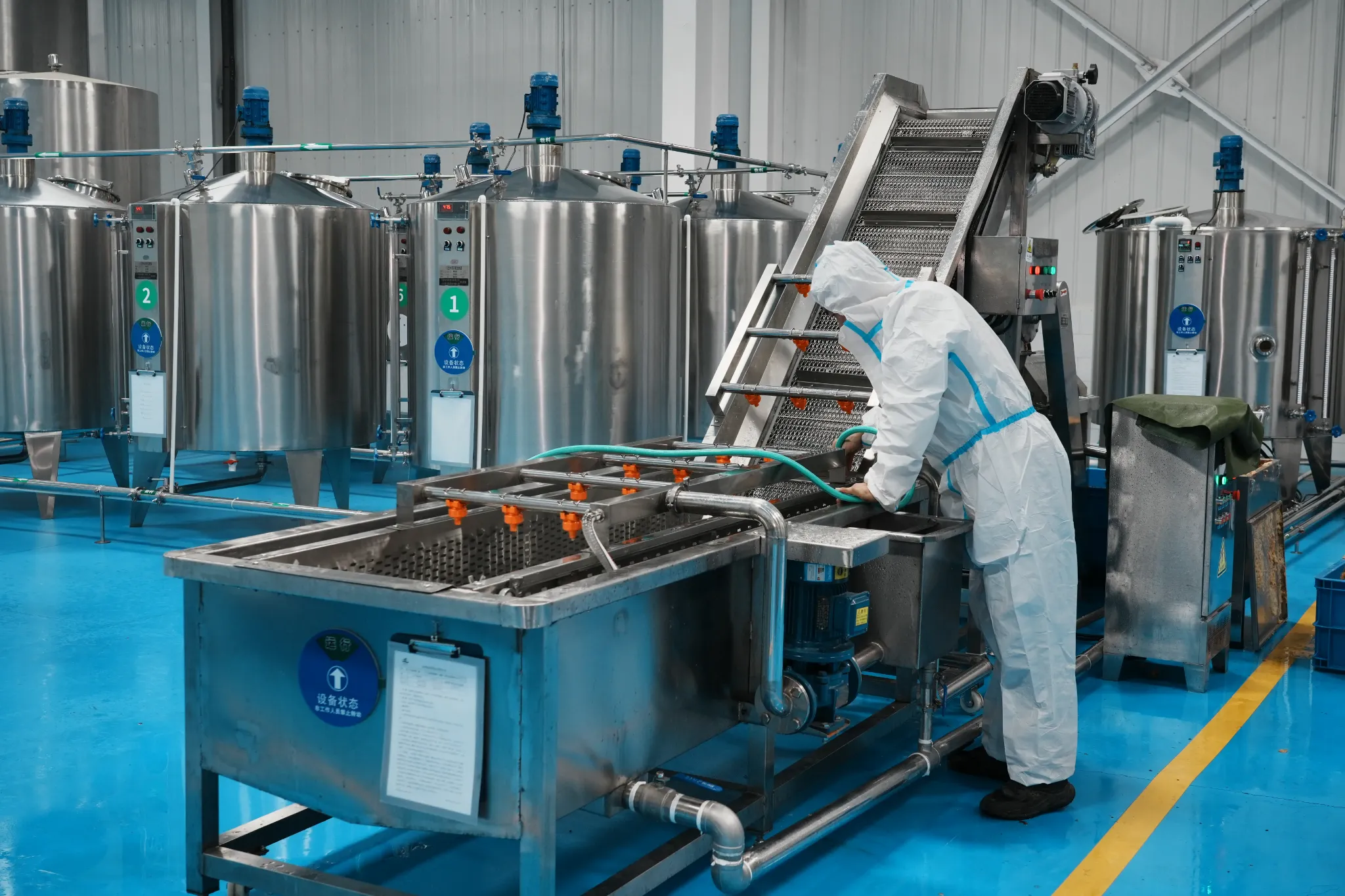Herb processing equipment on the GMP production floor at our manufacturing partner in Pingliang, Gansu